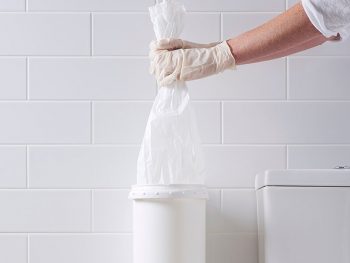 An image showing how to service Pod Classic Liner Step #1 - remove liner from unit and dispose of waste