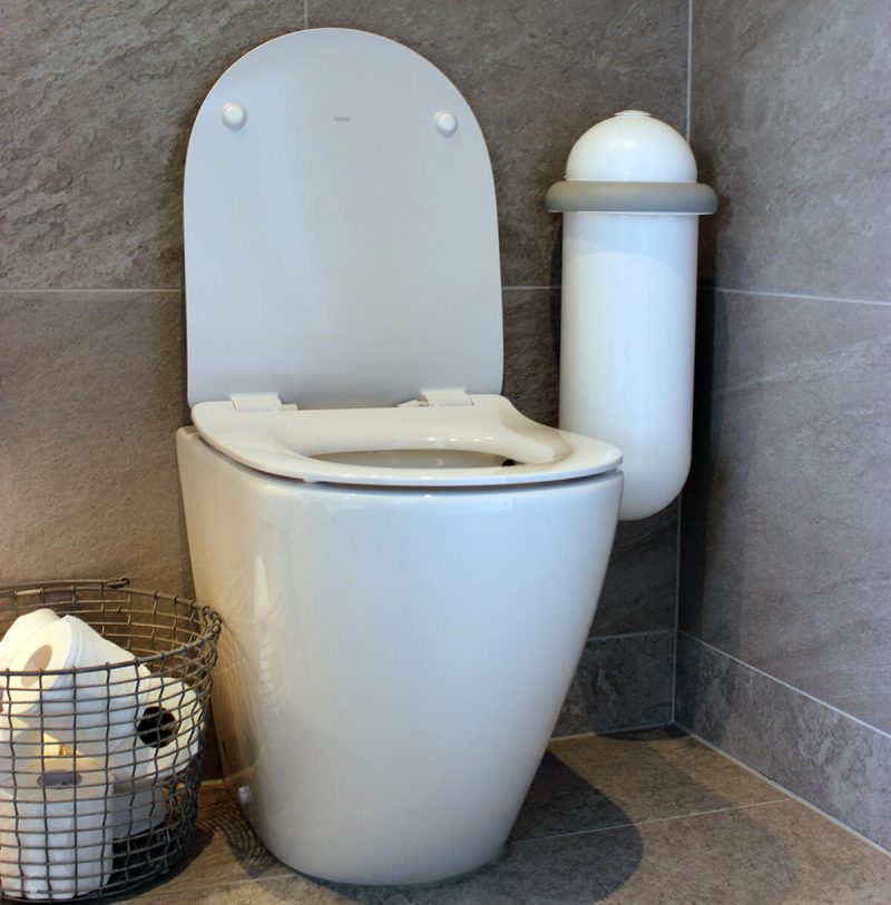 The Pod Classic Mini placed next to a toilet