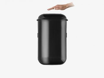 The black Pod Petite Auto with a hand over touch-free sensor