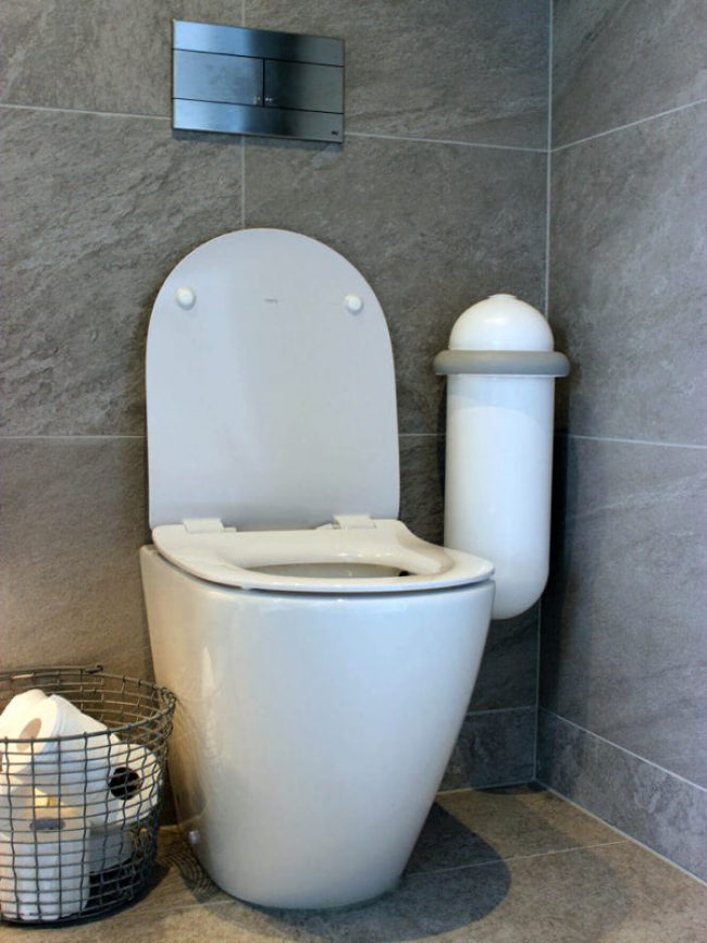 The Pod Classic Mini placed next to a toilet
