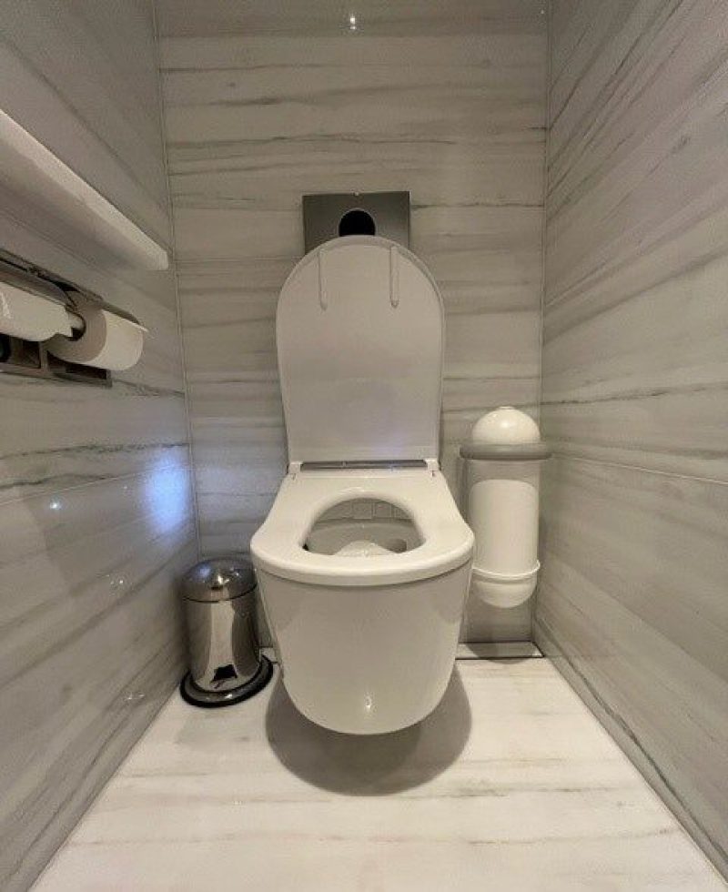 Different bathroom designs showing luxury bathroom solutions. Sanitary bins can be hygienically hands-free with Pod Classic Mini